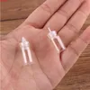 100 sztuk 11 * 22 * ​​6.5mm 1 ml mini szkło życząc butelki małych słoików fiolki z plastikowymi stopergodami