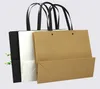 クラフトペーパーブラックホワイトショッピングギフトラップビジネスウェディングパッケージングバッグはカスタマイズされていますロゴ22x17 25x32 30x42cm