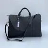 Top Quality Men Fashion Duffle Bag Black Nylon Travel Bags Mens Handle Luggage Gentleman Business Totes with Shoulder Strap 54CM3096