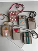 Mobiltelefontaschen echte Leder -Frauen Mini -Schulter -Designer 2021 Handtaschen Geldbörse Modemessengertasche für Frau