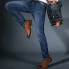 Весна осень мужские умные эластичные джинсы бизнес мода прямые регулярные растягивающие джинсовые брюки мужчины джинсы плюс размер 28-40 211008