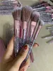 Фиолетовые кисти для макияжа устанавливают Tuolidi 10pcs Foundation Blush Brush Brush Screend Eyesheadow Make Up Set1881371