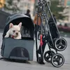 犬のカーシートカバーペットキャットベビーカーキャリアバッグ折りたたんだ生まれたベビープルカート4輪トランスポータートラベル270n