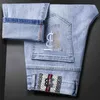 Sommer 2021 Dünne männer Jeans Koreanische Version Kleine Fuß Slim Fit Baumwolle Elastische Internationale Stickerei