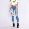 Kvinnors jeans kvinnors koreanska hål rippade tofs vintage mager blyertsbyxor damer streetwear 2022 mode lång längd kvinnor