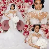2022 Modest sjöjungfru bröllopsklänningar Långärmade Brudklänning Beaded Crystals High Neck Lace Applique Sweep Train Custom African Plus Size Vestido de Novia