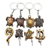 4PCS Cool Hawaiian Surf Sea Turtles Keyrings Imitatie Yak Bone Cute Tortoise Keychains Auto Key Rings for Men Women039S Geschenken K8514951