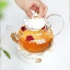 شاي شاي كلاسيكي أوروبي معطرة إبريق الشاي الزجاجي الشفاف مجموعات الشاي مجموعات أبيض للصواني السيراميك الصحن الصحن