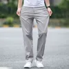 Été nouveaux hommes mince coton kaki pantalons décontractés affaires couleur unie Stretch pantalon marque mâle gris grande taille 40 42 44 210406