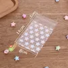 100 stks / pak Star Adhesive Bag Golden Design Party Cookies DIY Gift Verpakking Zakken voor Kerst Huwelijks Candy Food 20220223 Q2