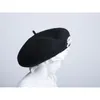 القبعات الدلفين الفاخرة المرأة الجميلة الصوف النمط البريطاني اليابانية البرية اللؤلؤ bowknot الفنان الأسود كاب الشتاء الرسام قبعة القبعات