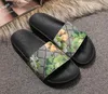 129kw dernières haute qualité hommes conception femmes tongs pantoufles mode cuir diapositives sandales dames chaussures décontractées