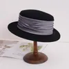 svart diskette fedora hatt