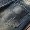 Jeans da uomo blu retrò primavera punk ricamo pantaloni denim tigre Pantalones Para Hombre Vaqueros