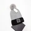 Chapeau Tricoté De Luxe Designer Beanie Cap Hommes Pompons De Fourrure De Raton Laveur Chapeaux Chauds Unisexe Couples Lettres Casual Skull Caps Mode De Plein Air De Haute Qualité