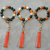 Keychains 1Pcs Halloween Tassel Keychain Wood Beads Wrist Strap Bracelet For Women Keys Pu Leather Keyring Jewelry Gifts Miri22