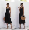 Abito lungo da donna Estate Sexy Backless Casual Bianco Nero Increspato Slip Midi Prendisole Ladies Spaghetti Strap Vestido Abbigliamento 210521