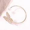 Mode évider brillant diamant incrusté Bracelet perle papillon ouvert Bracelet réglable