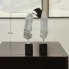 ノルディックスタイルの創造的な羽毛ケースの装飾品シンプルな現代家のリビングルームの装飾工芸品の装飾デスクアクセサリー210924