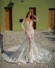 Arabo Aso Ebi 2021 Abiti da sposa di lusso con perline di pizzo Sheer Neck Maniche lunghe Vintage Abiti da sposa sexy ZJ366