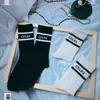 Heren Sokken Net Red Race L Tide Brand Letter Golf Tennis Stripe Men's and Women's College Style Casual Socks T23013280m