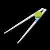 1Pair barn lärande träning ätpinnar barn baby lärande för barn kinesisk chopstick lärare gåvor