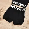 Ny flicka barn barn svart kläder sätter kortärmad brev skörd topp t-shirt shorts kläder sommar casual solsuit outfit 1307 y2