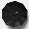 男性の雨の黒いコーティング10K 211124のためのパロニーブランドの革抵抗の折りたたみの自動傘男性の自動高級大きさの大きな防風の傘