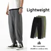 Lösa casual raka byxor japanska streetwear svart joggare byxor män solid lätt andningsbar koreansk mode kostym byxor 211008