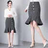 夏のハイウエストシックなフィッシュテールの女性のスカート韓国風のスリムフィットフリルワンステップヒップ格子縞8818 50 210528