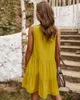 エレガントな黄色い夏の女性のドレスカジュアルな緩いVネック固体ノースリーブタッセルミニホリデイビーチドレスvestidos W746 210526