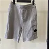 Ein Objektiv Reißverschluss Pocket Männer kurze Hosen lässige Baumwollbrille Abnehmbare Männer Shorts Größe M-XXL Schwarz