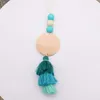Foreign trade beaded food-grade silicone keychain can print round wood chips, three-field tassel key ring, multi-color optional