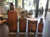 Högkvalitativ 500 ml Tom Roller Frostat Amber Plasti Bottle Soap Dispenser med svart lotionpumpleverantör i chinagoods