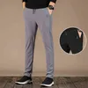 Czarne spodnie sportowe Mężczyźni Letnie Oddychające Szybkie Dry Casual Zipper Kieszeni Spodnie dresowe Mężczyźni Marka Luźne Męskie spodnie 211112
