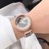 ファッションブランドの時計女性女の子クリスタルビッグレター回転ダイヤルスタイルスチールマットベルバンド腕時計腕時計M120