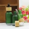 Flacon compte-gouttes en verre vert ambre givré 5 ml 10 ml 15 ml 30 ml 50 ml 100 ml avec bouchon en bambou 1 oz bouteilles d'huile essentielle en bois