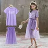 As crianças do verão conjuntos de manga curta casual o Pescoço letra t-shirt malha roxo saia sólida 2pcs roupas meninas 3-12T 210629