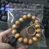 Porte-clés en perles en bois, bricolage, Bracelet de poignet, pendentif, pompon, cadeau créatif