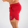 MuscleGuys Herrstyrelse Shorts Sexig Beach Bermuda Wear Sea Short Men Gym Snabbtorkare Sweatpants Fitness 210713