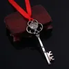 Monogram Santas Magic Key Claus Keychain Shaped Christmas Ornaments Dekorationer Halloween Snowflake Ribbon Wand Gifts Xmas Pendant Alloy Halsband med rött rep