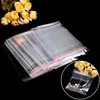 Emballage cadeau 100pcs transparent auto-scellage petits sacs en plastique bijoux emballage adhésif cookie bonbons sac d'emballage