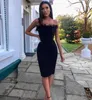 Summer Sexig stropplös backless Feather Black Midi Women Bodycon Bandage Dress Designer Fashion Party Club Vestido 220111