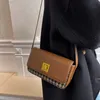 Fashion Shoulder Bag Ancient Gold Lock Små kvinnors färg matchande elegant chic crossbody all-match stil