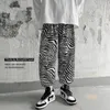 Pantaloni casual con motivo zebrato a stampa intera Pantaloni hip-hop a nove punte allentati coreani stile primavera e autunno da uomo