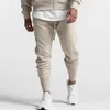 Męskie spodnie dresowe męskie zima 2022 bawełniane sporty jogging czarny stretch belki spodnie stóp jesień szary moda pantalon hommes