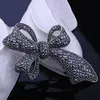 Spille, spille Moda strass Fiocco nero per donna Grande spilla vintage carina Pin Accessori per cappotti invernali Alta qualità