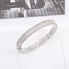 Bracciale rigido punk con ciondolo di qualità di lusso con tutti i diamanti scintillanti in tre colori placcati per il regalo di gioielli da sposa da donna con timbro sulla scatola PS7327