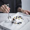 Il design creativo a forma di pala del cucchiaio da dessert aggiunge divertimento può essere usato per mescolare bevande dessert mangiare frutta comoda maniglia per prendere e facile7034933