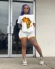 المرأة المطبوعة قطعتين أفريقي جولة الرقبة قصيرة الأكمام تي شيرت ومجموعة السراويل القصيرة - أزياء الصيف تراكسويت 2021 رياضية
